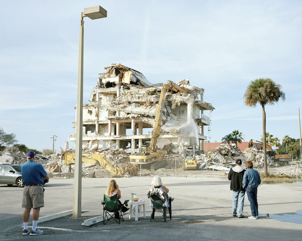 Spectators watch the demolition of the Glass Bank building in Cocoa Beach, former home of Ramon’s Rainbow Room, 2015