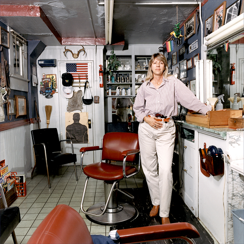 Barber Sandra Wolf with .38 caliber Lady Smith and Wesson, Long Beach, California, 1993.
